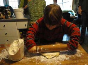 Rolling the dough.