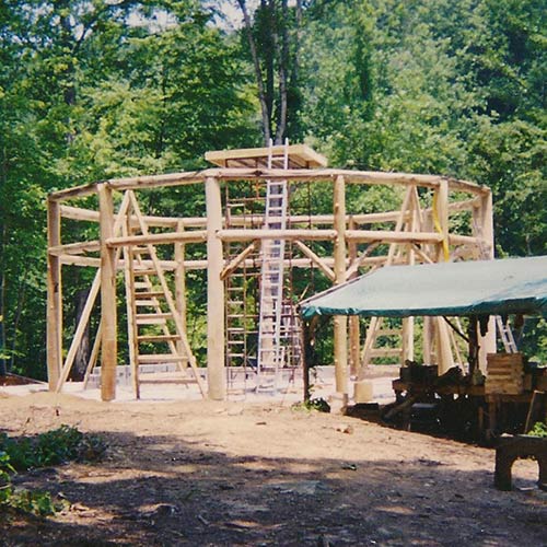 Earthaven Council Hall round-pole timber frame structure