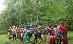 Completing the May Pole dance at Earthaven