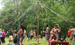 Starting the May Pole dance at Earthaven Ecovillage